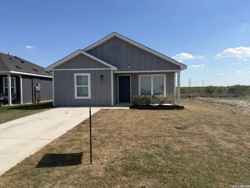 Front exterior of a new home in Red Hawk Landing, San Antonio, TX, highlighting curb appeal (Image 1). Front exterior of a new home in Red Hawk Landing, San Antonio, TX, highlighting curb appeal (Image 1).