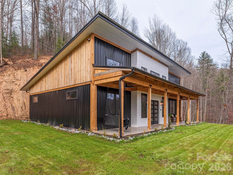 Exterior details and patio area of a home in , Waynesville (Image 20).