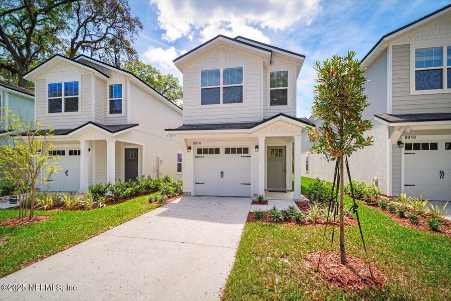 Front exterior of a new home in , Jacksonville, FL, highlighting curb appeal (Image 1). Front exterior of a new home in , Jacksonville, FL, highlighting curb appeal (Image 1).