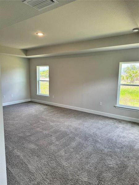 Spacious, unfurnished interior of a new home in Watercress Cove, North Port (Image 5).