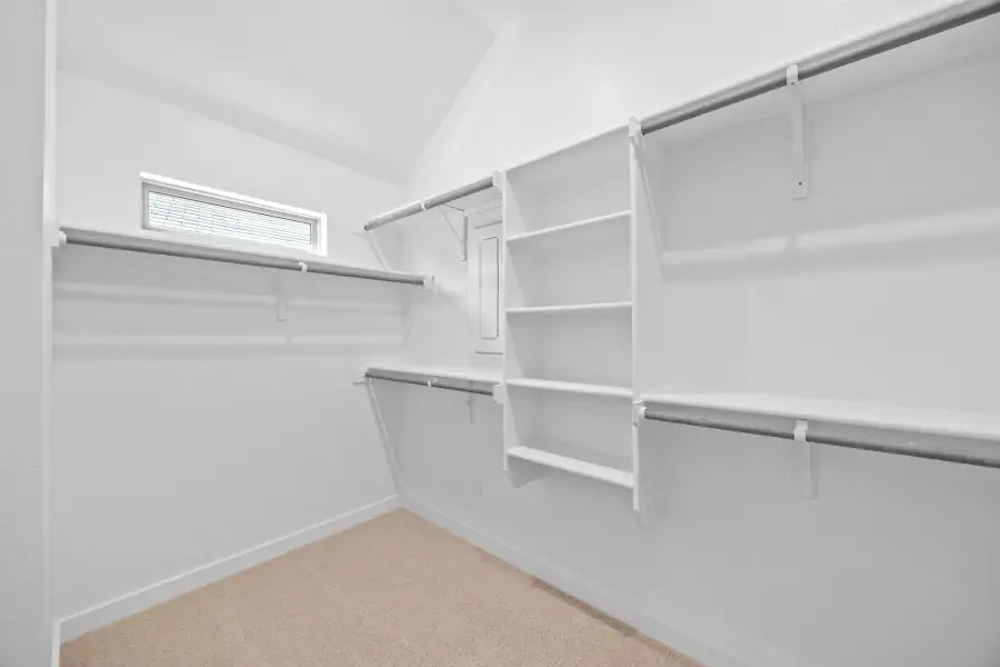 Primary Closet in the Quartz home plan by Trophy Signature Homes – REPRESENTATIVE PHOTO Primary Closet in the Quartz home plan by Trophy Signature Homes – REPRESENTATIVE PHOTO