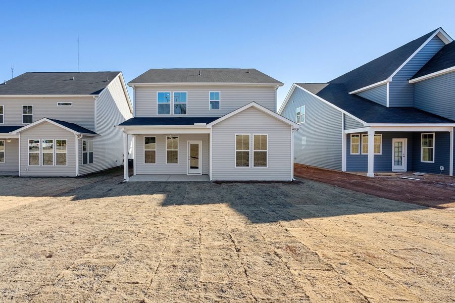 Exterior details and patio area of a home in Renaissance at White Oak, Garner (Image 20).