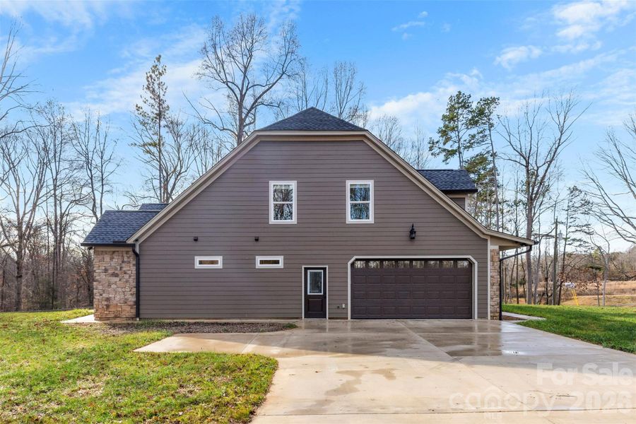 Front exterior of a new home in , Belmont, NC, highlighting curb appeal (Image 19). Front exterior of a new home in , Belmont, NC, highlighting curb appeal (Image 19).