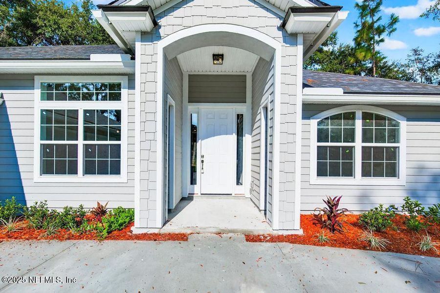 Front exterior of a new home in , Jacksonville, FL, highlighting curb appeal (Image 32). Front exterior of a new home in , Jacksonville, FL, highlighting curb appeal (Image 32).