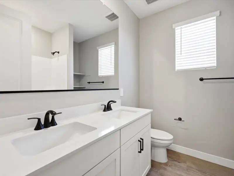 Furnished interior view inside a new home in Blossom Rock Reserve Series, Apache Junction (Image 8).