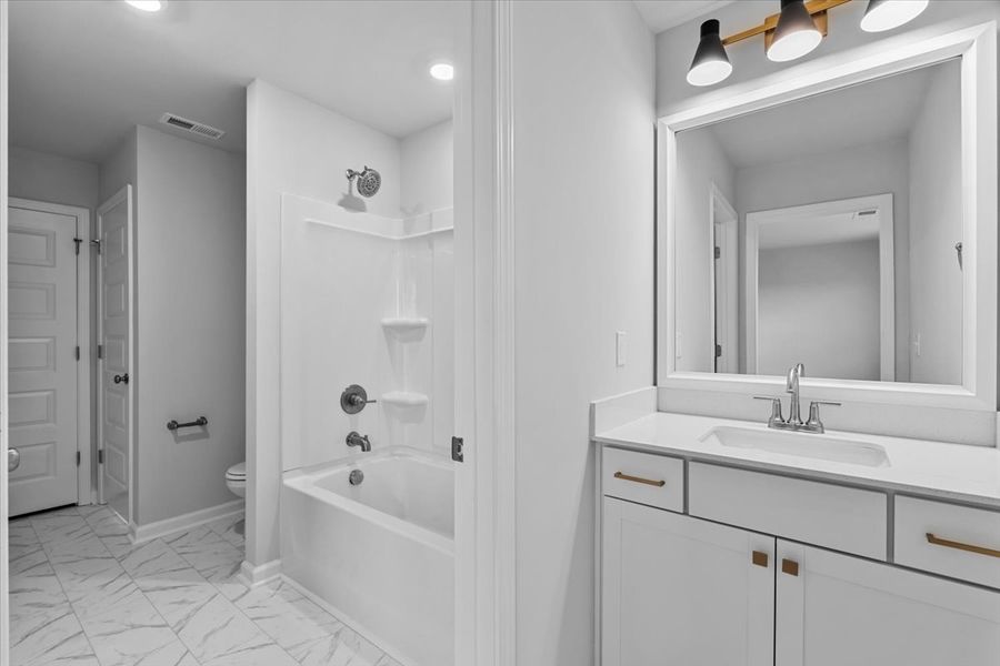 Furnished interior view inside a new home in Fieldstone, Lexington (Image 14).