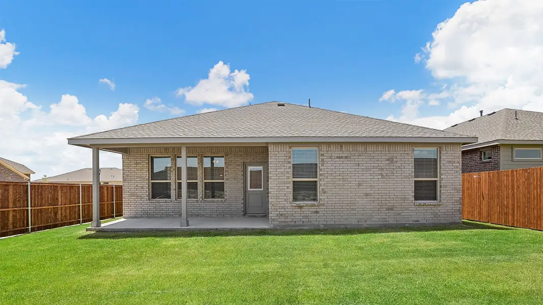 Exterior details and patio area of a home in Bluestem, Rhome (Image 3).