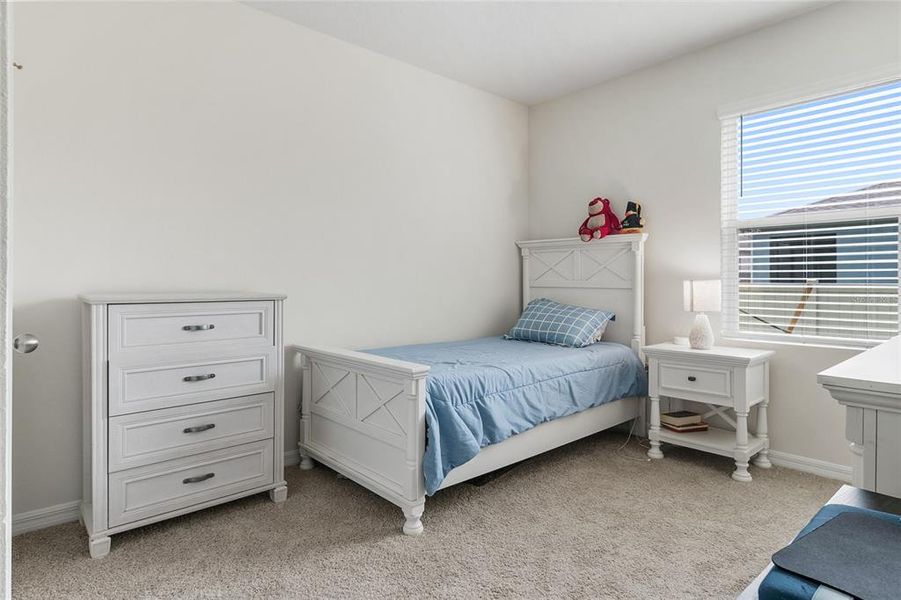 Furnished interior view inside a new home in Lake Deer Estates, Poinciana (Image 11).
