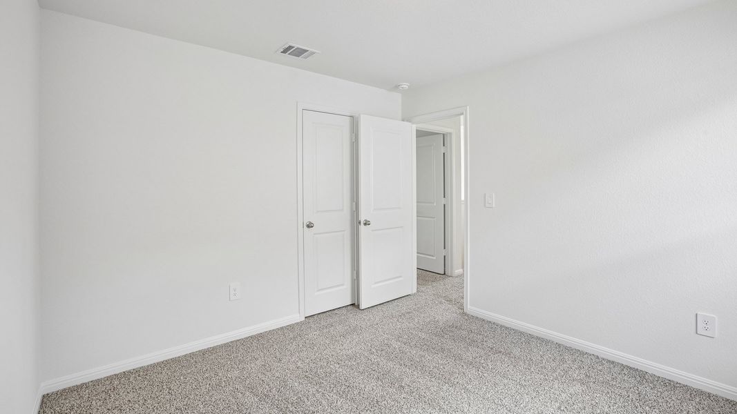 Spacious, unfurnished interior of a new home in Bar W Ranch, Leander (Image 36).