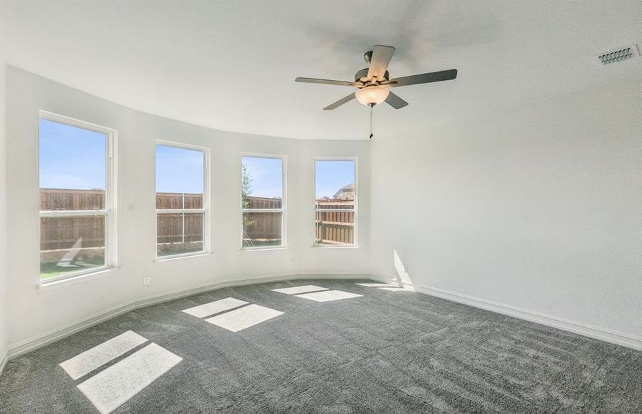 Elegant owner's suite with Bay window  *real home pictured