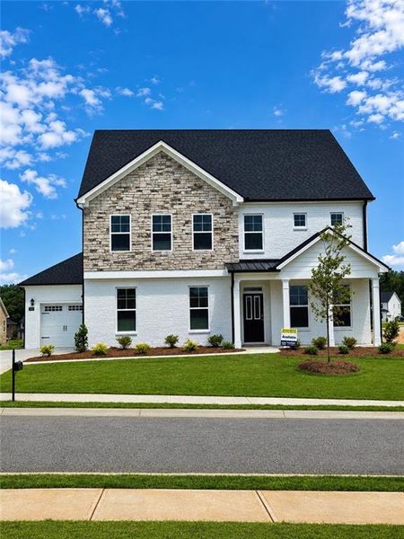 Front exterior of a new home in Westland, Bogart, GA, highlighting curb appeal (Image 1). Front exterior of a new home in Westland, Bogart, GA, highlighting curb appeal (Image 1).