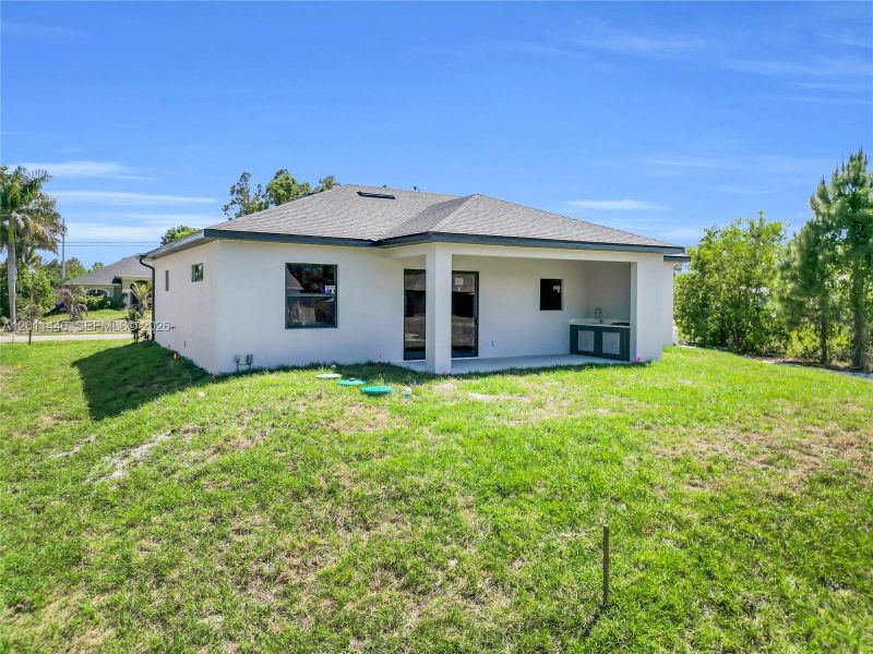 Exterior details and patio area of a home in , Lehigh Acres (Image 26).