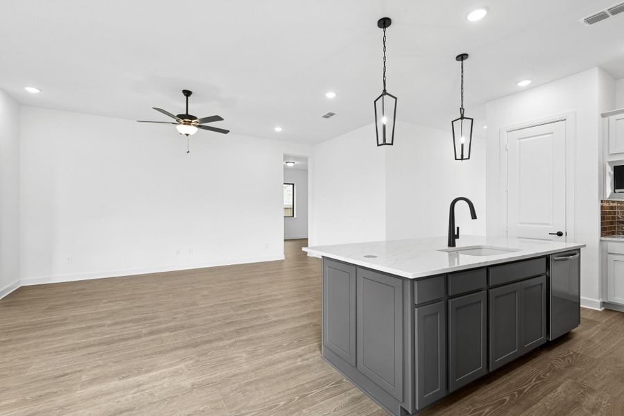 Furnished interior view inside a new home in Riceland - Enclave Row Collection, Mont Belvieu (Image 5).