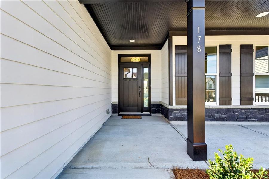 Exterior details and patio area of a home in Twin Lakes, Hoschton (Image 3).