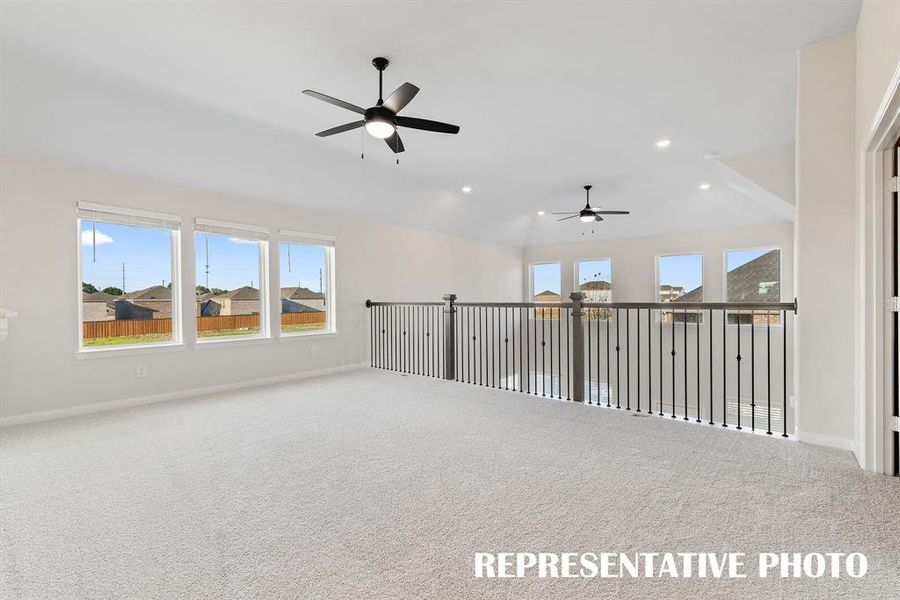 Light, bright and airy, the family fun time never ends in this over the top game room!  REPRESENTATIVE PHOTO