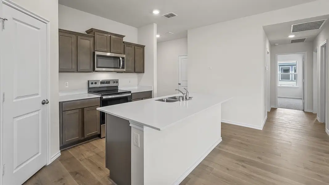 Representative furnished interior of a home built from the Elgin by D.R. Horton in Oak Valley Estates, Bullard (Image 4). Representative furnished interior of a home built from the Elgin by D.R. Horton in Oak Valley Estates, Bullard (Image 4).