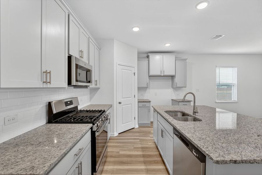Furnished interior view inside a new home in Lisso, Pflugerville (Image 6).