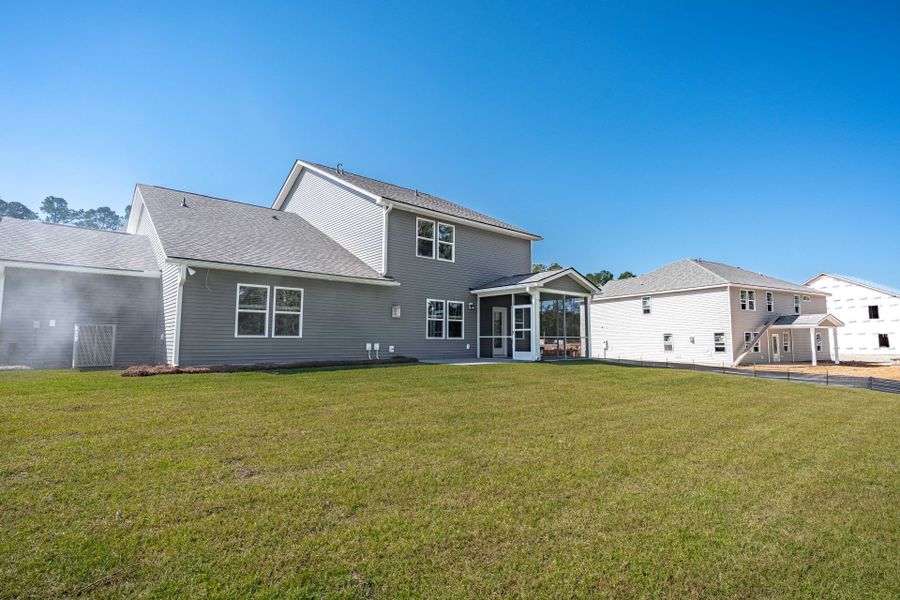 Exterior details and patio area of a home in Oakleaf Chase, Blythewood (Image 25).