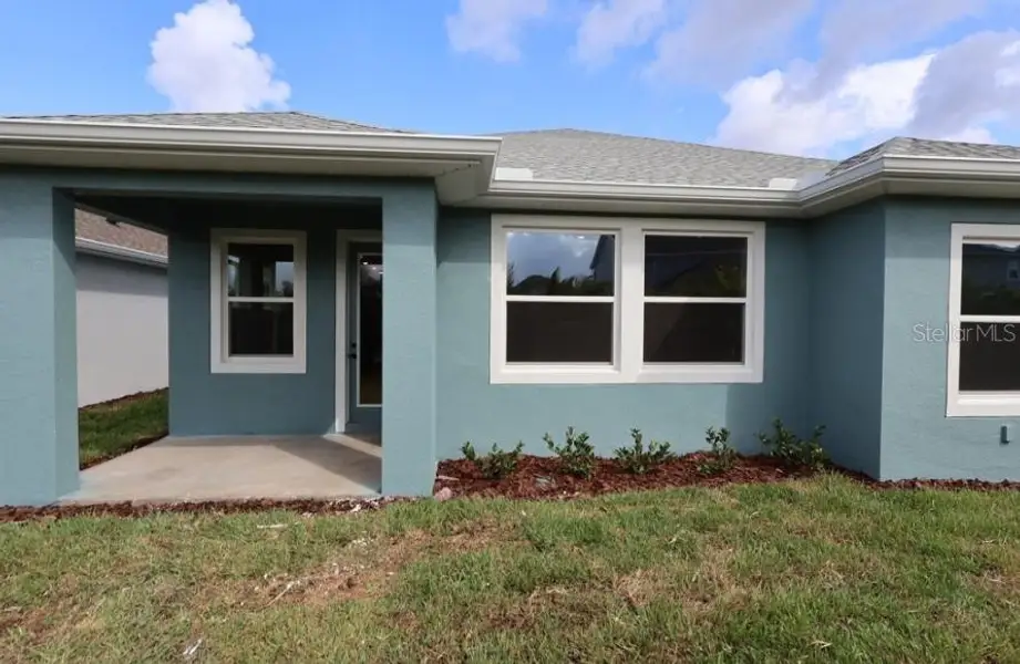 Exterior details and patio area of a home in Waterset Classic Series, Apollo Beach (Image 4).