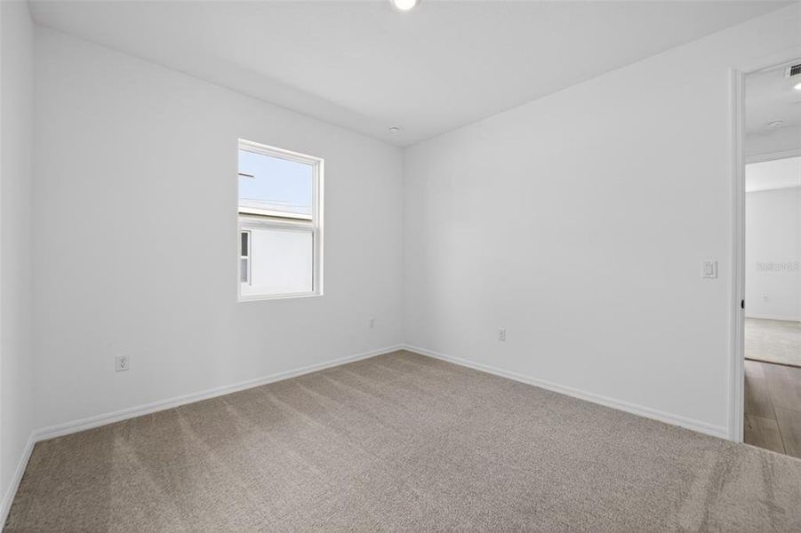 Spacious, unfurnished interior of a new home in Tyson Reserve, St. Cloud (Image 21).