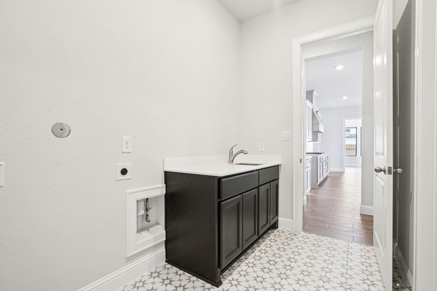 Furnished interior view inside a new home in Del Bello Lakes 60', Manvel (Image 20).