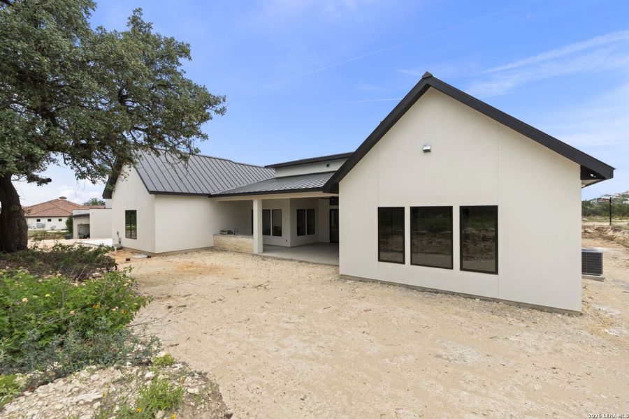 Exterior details and patio area of a home in , San Antonio (Image 38).