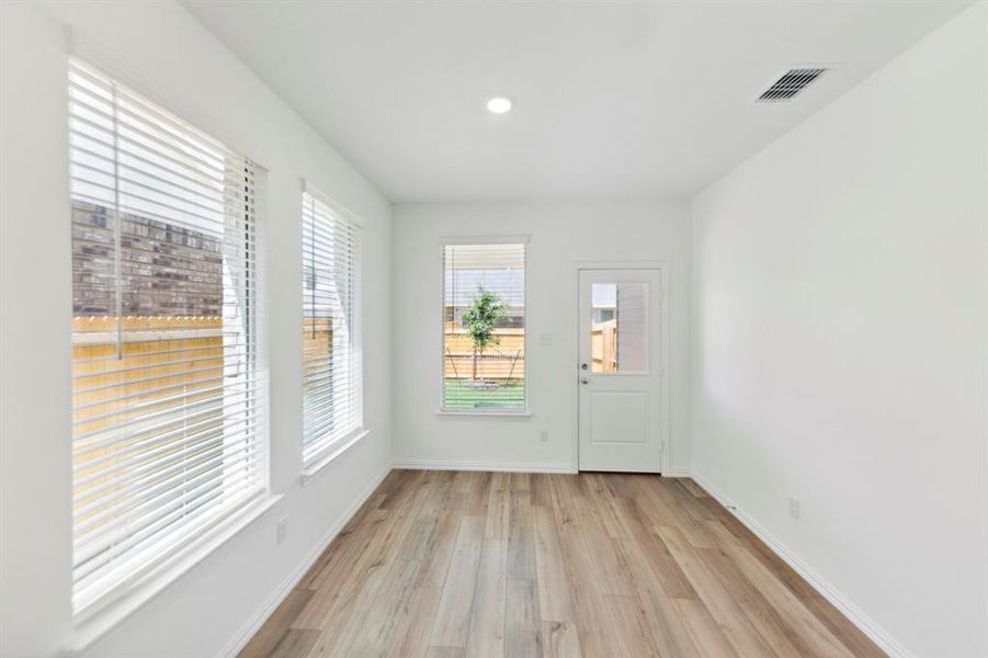 Doorway featuring light hardwood / wood-style flooring