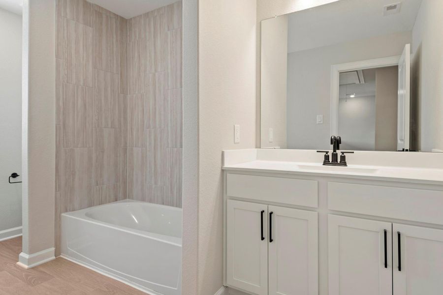 Furnished interior view inside a new home in Magnolia Woods, Magnolia (Image 8). Furnished interior view inside a new home in Magnolia Woods, Magnolia (Image 8).