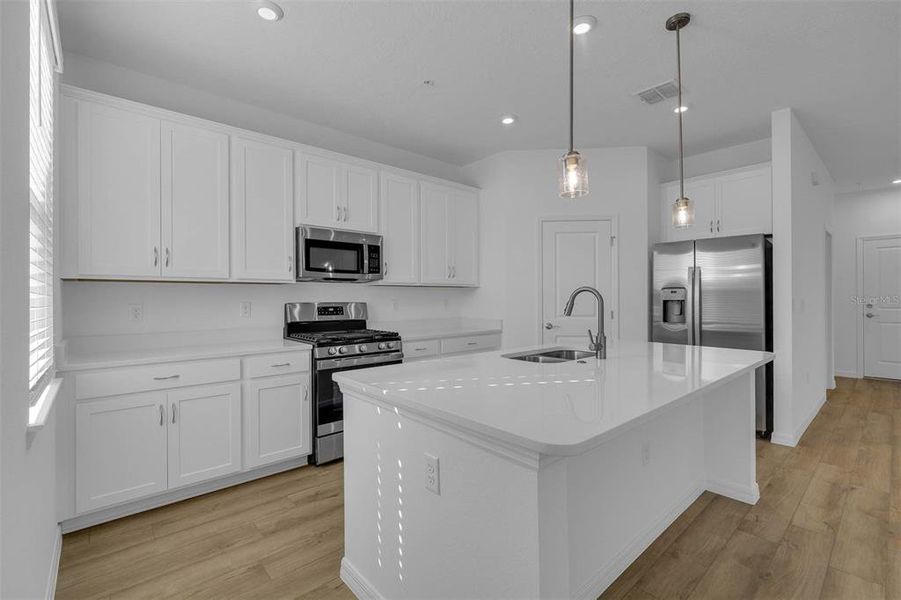 Furnished interior view inside a new home in Brack Ranch, St. Cloud (Image 9).