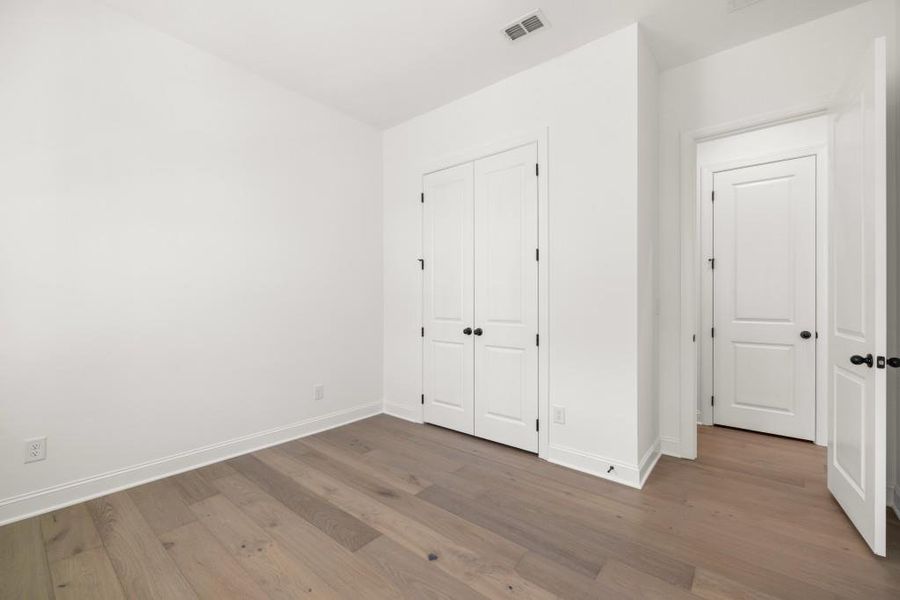 Spacious, unfurnished interior of a new home in East Harbor II at Chestatee, Dawsonville (Image 48).