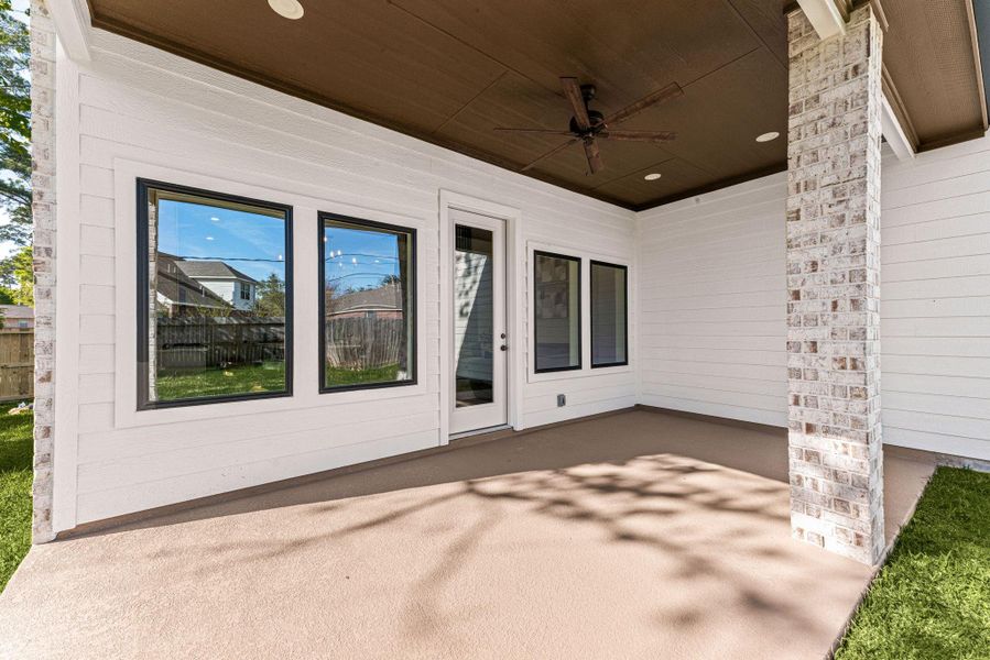 Exterior details and patio area of a home in , Tomball (Image 3).