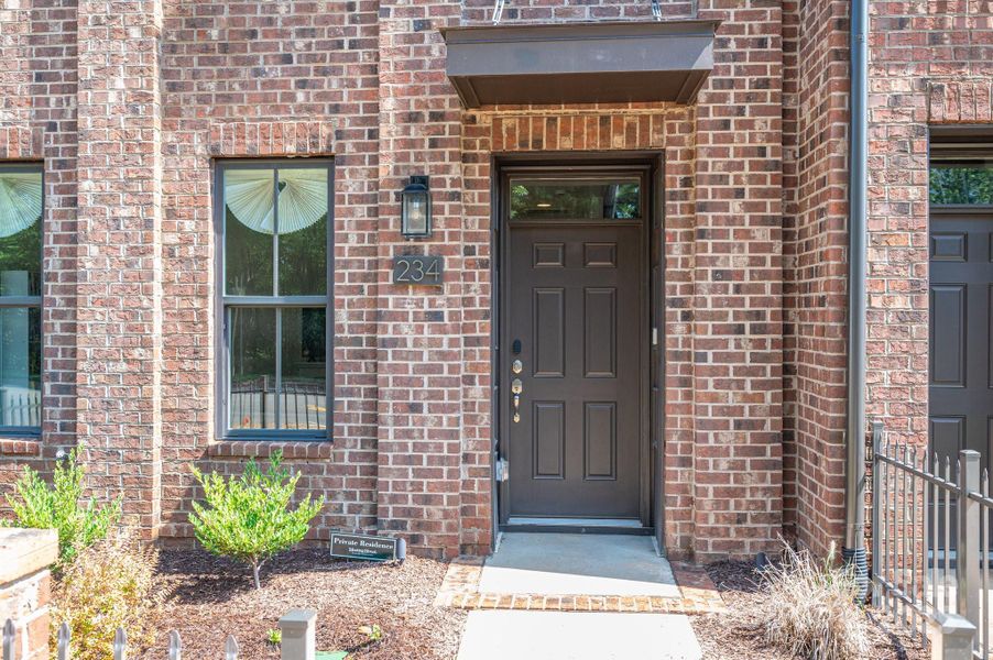 Front exterior of a new home in , Huntersville, NC, highlighting curb appeal (Image 19).