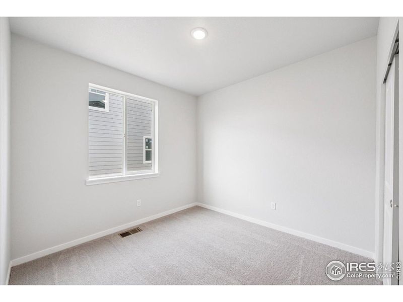 Spacious, unfurnished interior of a new home in Prairie Song, Windsor (Image 18).