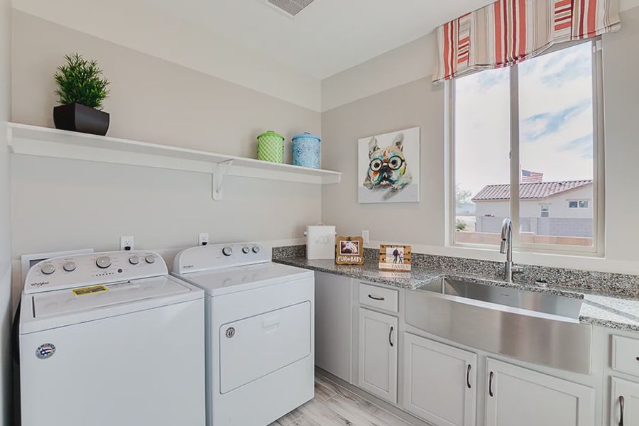 Representative furnished interior of a home built from the 203 by Elliott Homes in Las Barrancas, Yuma (Image 14).