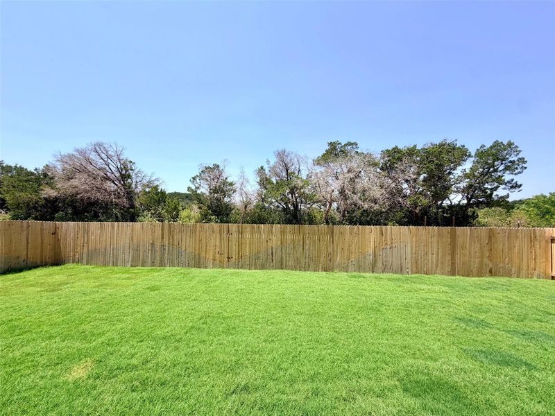 Exterior details and patio area of a home in Retreat at San Gabriel, Georgetown (Image 19).