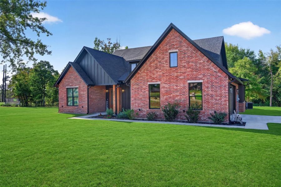 Front exterior of a new home in , Kilgore, TX, highlighting curb appeal (Image 26).