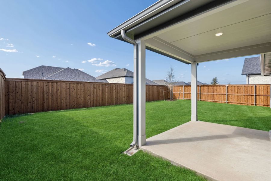 Covered Patio in the Emmy II home plan by Trophy Signature Homes - REPRESENTATIVE PHOTO
