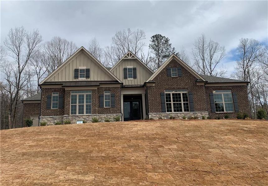 Front exterior of a new home in , Atlanta, GA, highlighting curb appeal (Image 1).