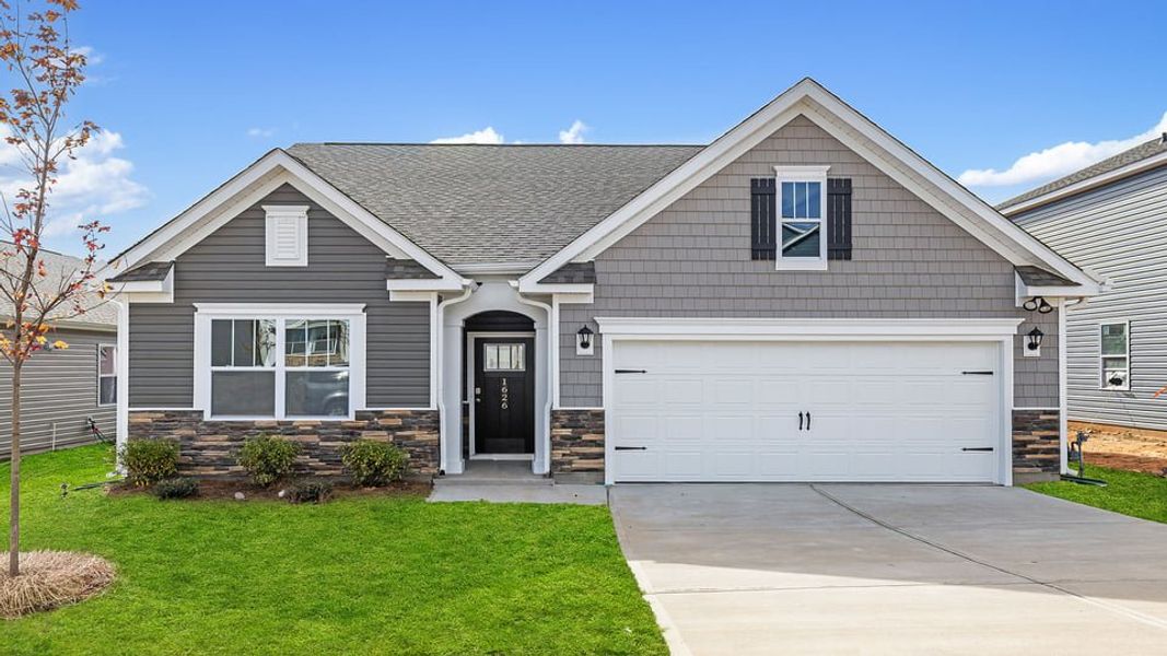 Front exterior of a new home in Baxter Village, Boiling Springs, SC, highlighting curb appeal (Image 1).