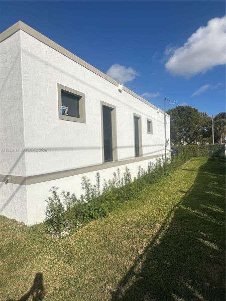 Exterior details and patio area of a home in , Florida City (Image 12).