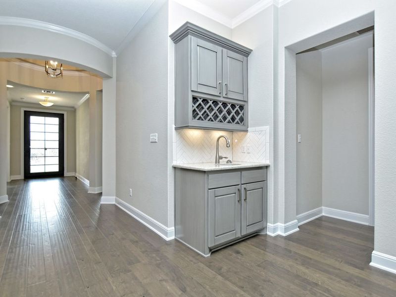 Representative furnished interior of a home built from the Madera II by Giddens Homes in Scofield Farms Estates, Georgetown (Image 165).