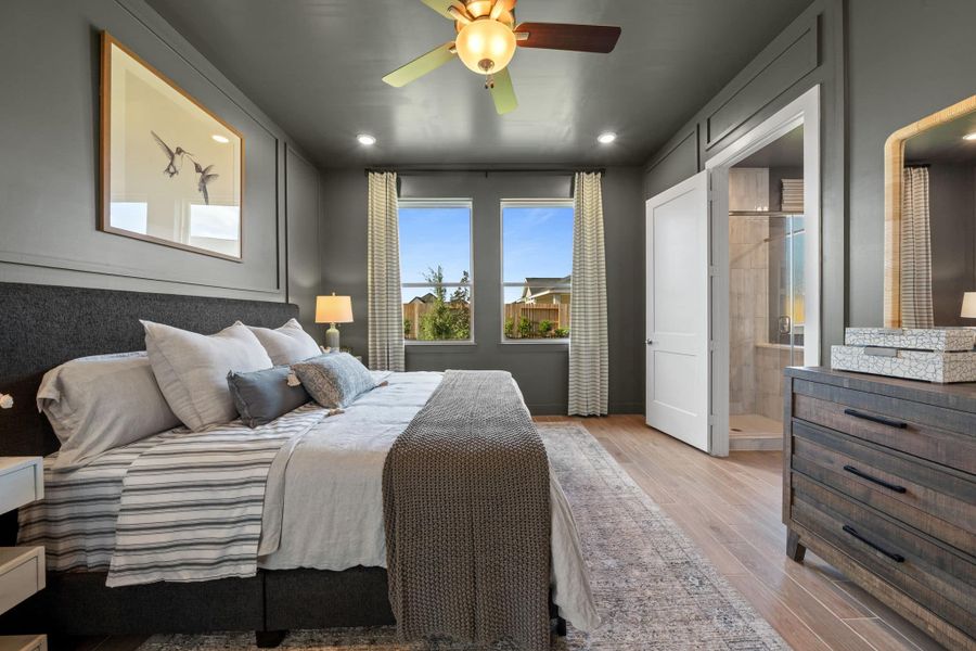 Representative furnished interior of a home built from the Bonneville 50′ Lot by Chesmar Homes in Elyson, Katy (Image 9).