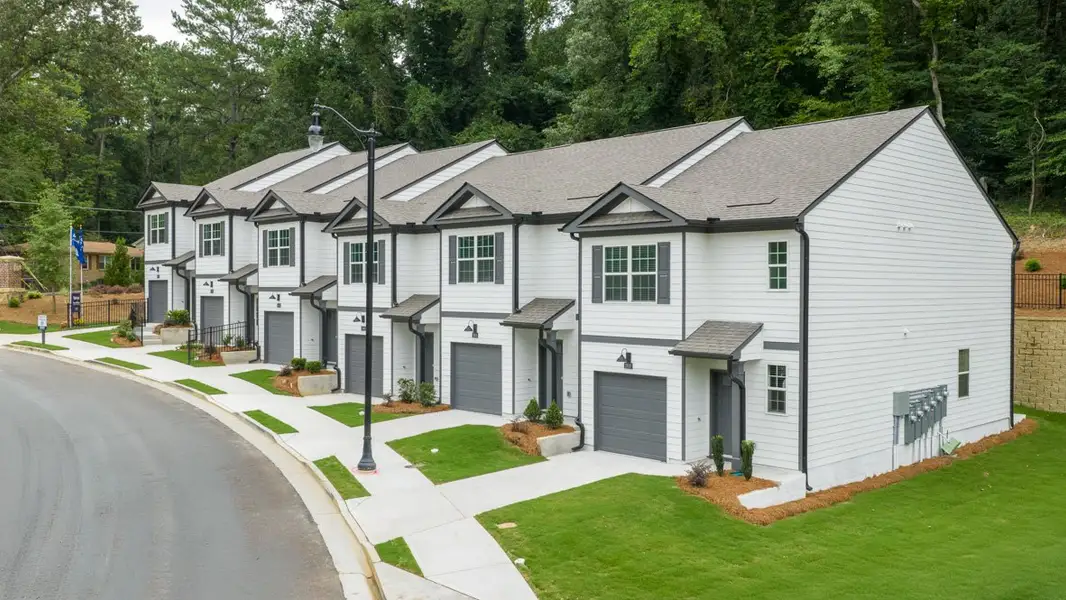Front exterior of a new home in Towns at Monroe, Atlanta, GA, highlighting curb appeal (Image 2).