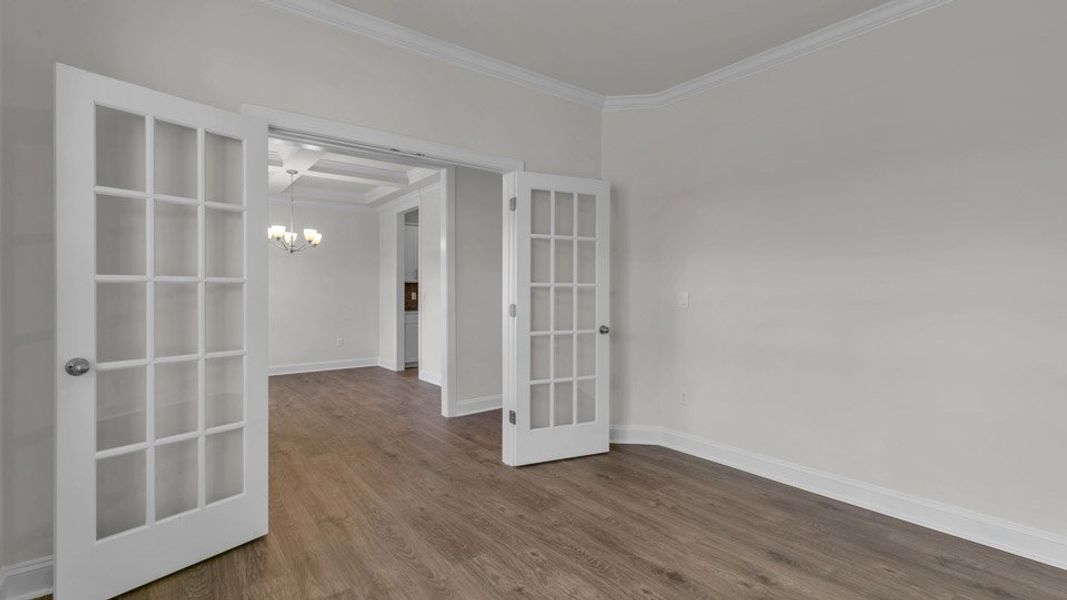 Representative unfurnished interior of a home built from the NORMAN by D.R. Horton in Eagle Creek, Fuquay Varina (Image 10).