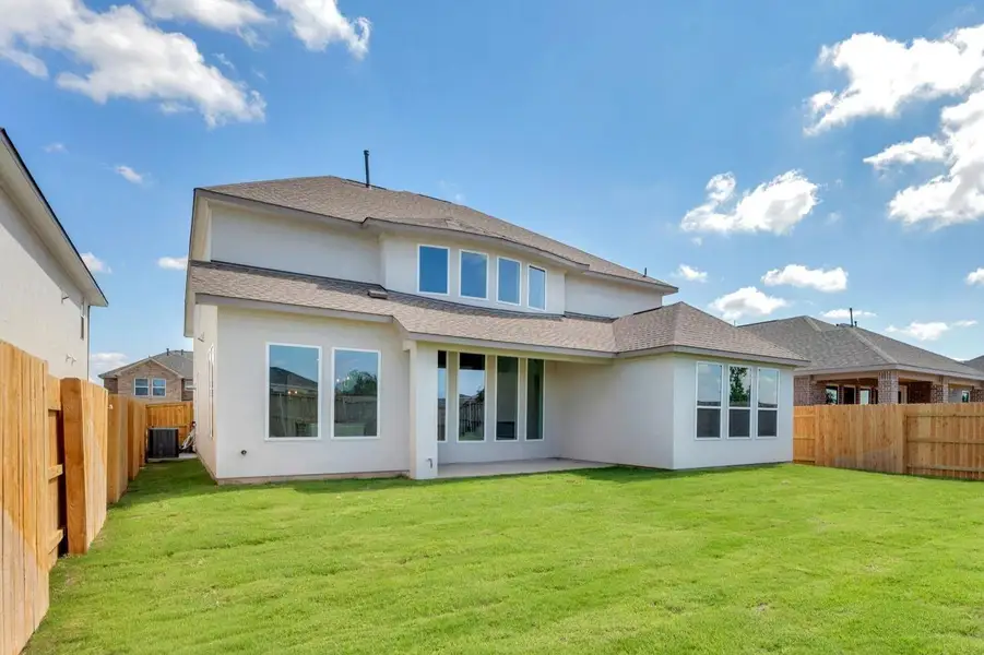 Exterior details and patio area of a home in The Colony - 50', Bastrop (Image 2). Exterior details and patio area of a home in The Colony - 50', Bastrop (Image 2).