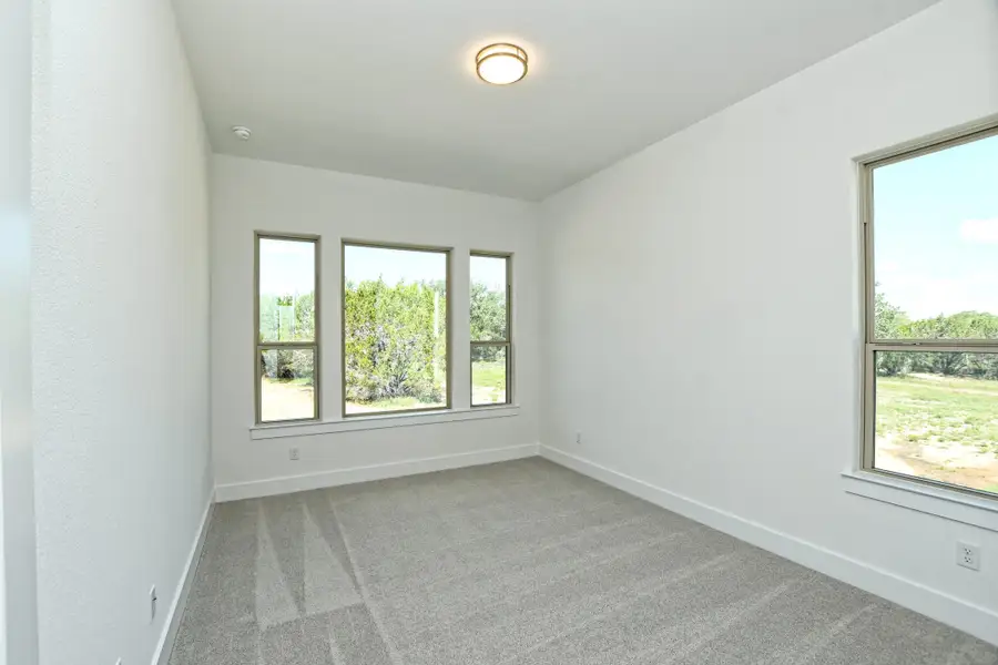 Representative unfurnished interior of a home built from the Siena III by Giddens Homes in Clearwater Ranch, Liberty Hill (Image 263).