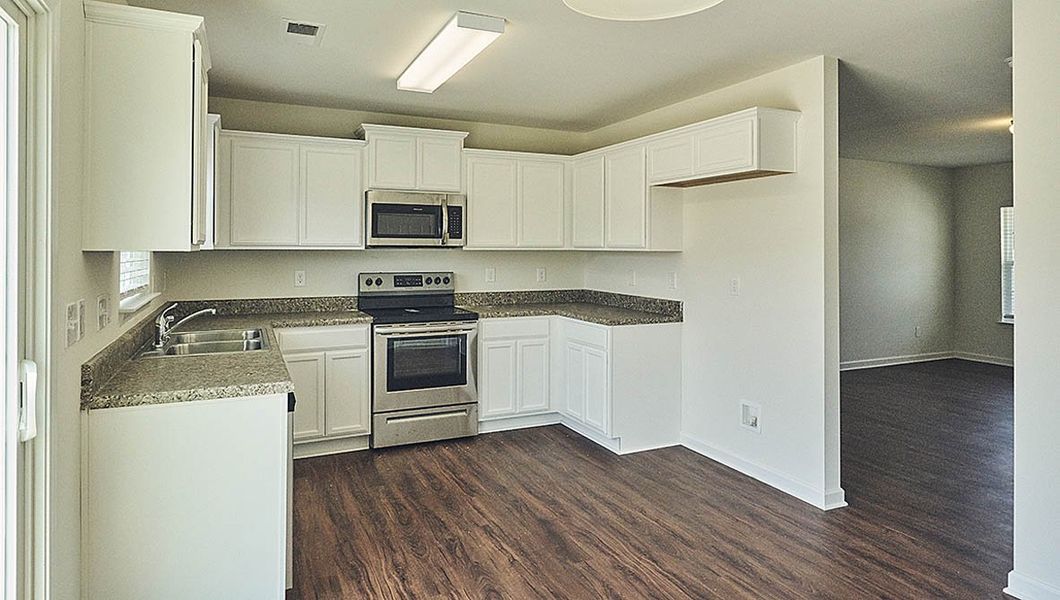 Representative furnished interior of a home built from the Rachel by D.R. Horton in Fishel Village, Winston-Salem (Image 5). Representative furnished interior of a home built from the Rachel by D.R. Horton in Fishel Village, Winston-Salem (Image 5).