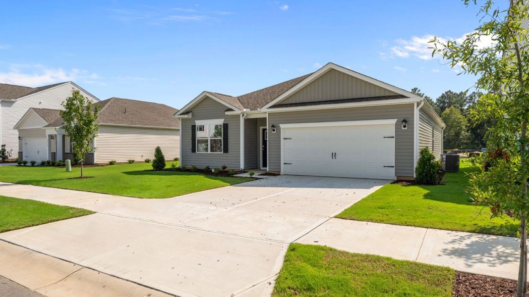 Front exterior of a new home in West New Bern, New Bern, NC, highlighting curb appeal (Image 15).