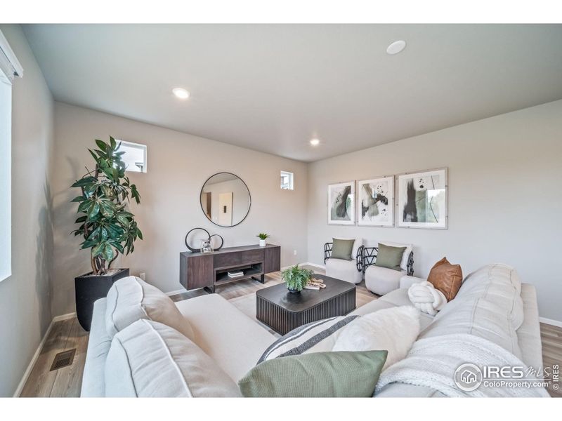 Furnished interior view inside a new home in Thompson River Ranch, Johnstown (Image 35).