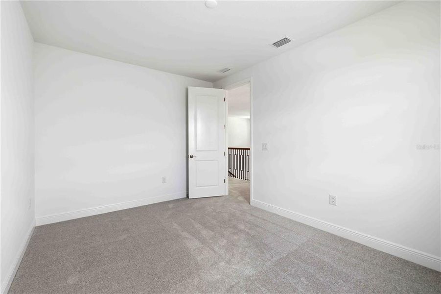 Spacious, unfurnished interior of a new home in Creeks Edge at Twin Rivers, Parrish (Image 54).